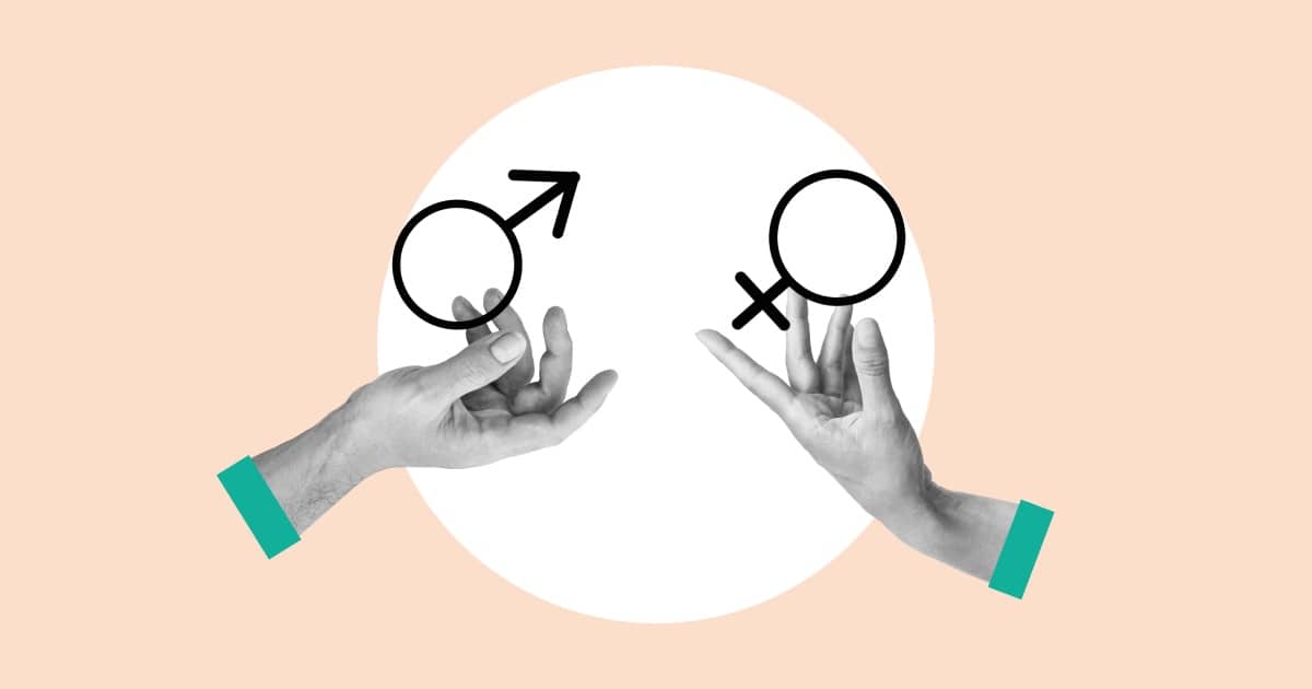 símbolo femenino y masculino sujetos por dos manos